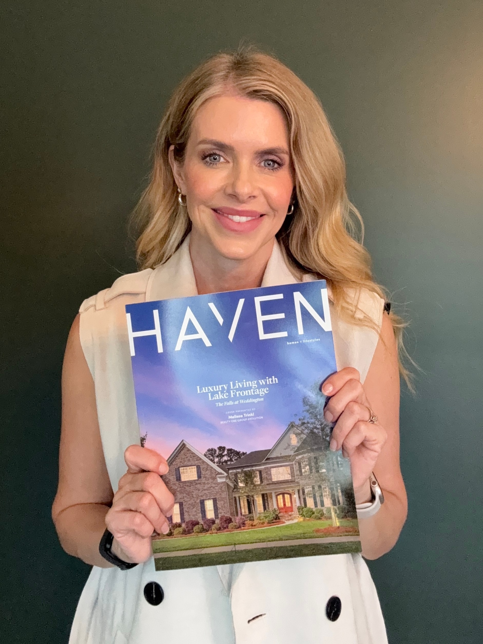 Melissa Trinkl holding the Haven North Carolina magazine