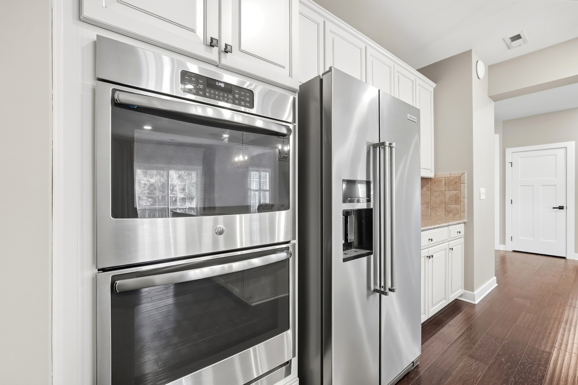 GE double wall oven and side-by-side refrigerator at 912 Manorwood Drive Waxhaw NC